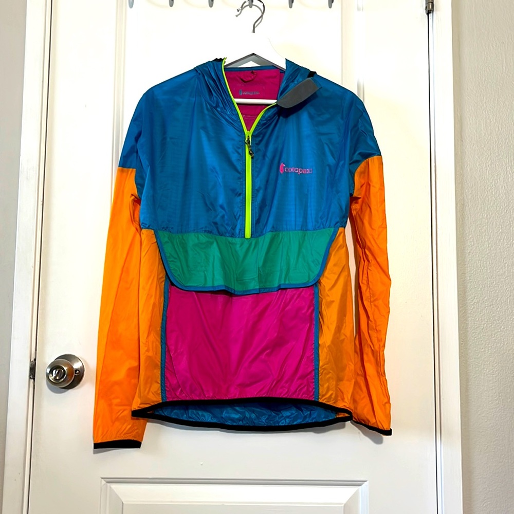 Cotopaxi windbreaker that folds into itself/pouch